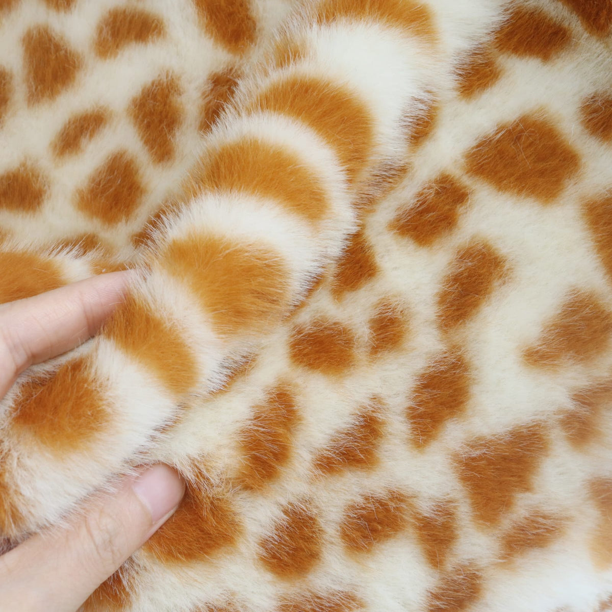 Faux giraffe spots Fabric