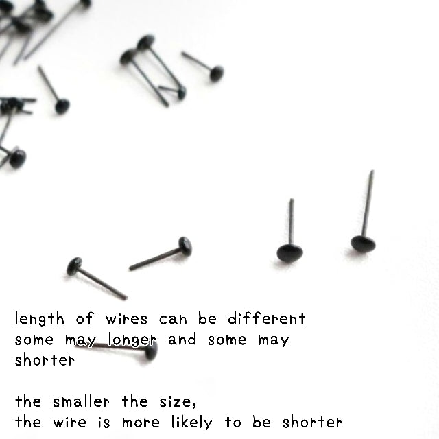 Tiny Glass Eyes On Wire