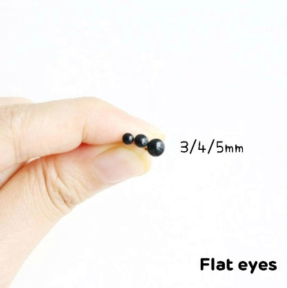 Tiny Glass Eyes On Wire