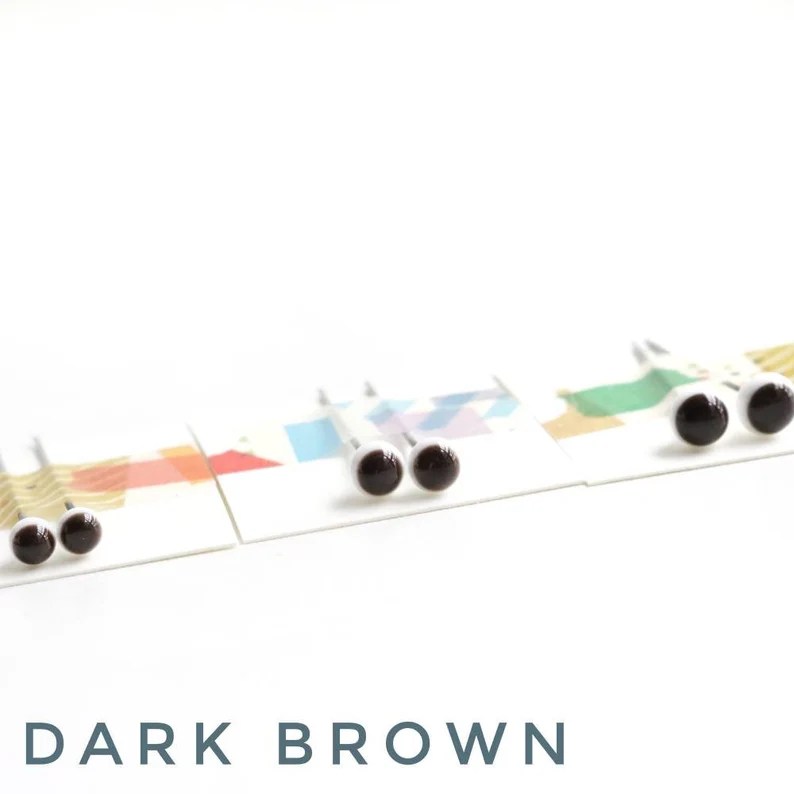 brown teddy bear glass eyes