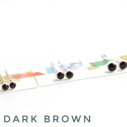 brown teddy bear glass eyes